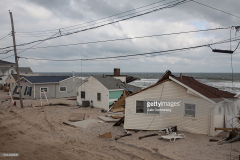 November 18, Ocean Beach, NJ, Beach front home destroyed by Superstorm Sandy's surge. Hurricane Sandy hit the Jersey Shore as a tropical storm causing billions of dollars of damage and cutting electricity to hundreds of thousands. Extreme weather is being blamed on climate change by many scientist.