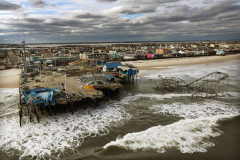 Waves break in front of a destroyed amusement park wrecked by Hurricane Sandy in Seaside Heights, New Jersey. (Mario Tama/Getty Images)